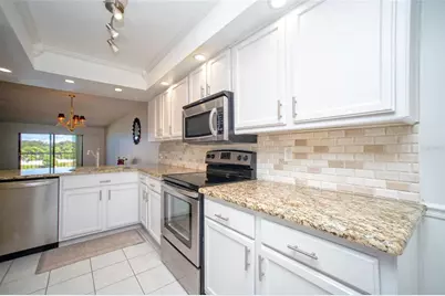 9490 Harbor Greens Way #306, Seminole, FL 33776 - Photo 10