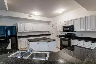 21019 Sunpoint Way #102, Lutz, FL 33558 - Photo 12