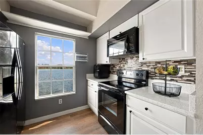 9570 Lake Chase Island Way #9570, Tampa, FL 33626 - Photo 14