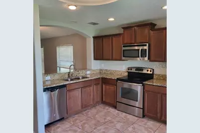10016 Newminster Loop, Ruskin, FL 33573 - Photo 6