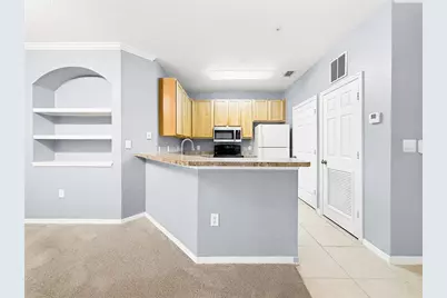10209 Courtney Palms Boulevard #203, Tampa, FL 33619 - Photo 2