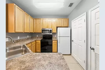10209 Courtney Palms Boulevard #203, Tampa, FL 33619 - Photo 4