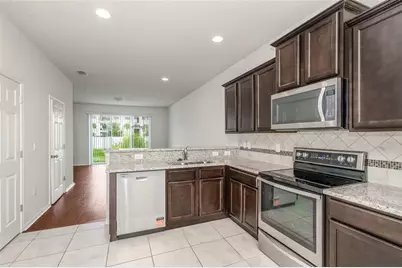 4714 White Sanderling Court, Tampa, FL 33619 - Photo 6