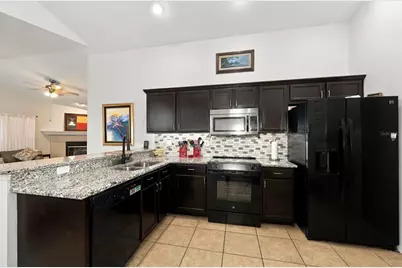 1783 Wood Brook Street, Tarpon Springs, FL 34689 - Photo 22