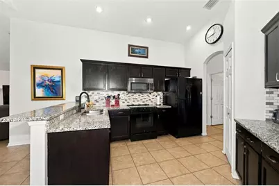1783 Wood Brook Street, Tarpon Springs, FL 34689 - Photo 20
