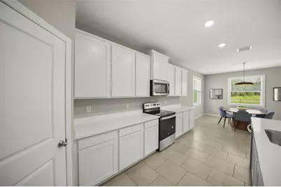 6016 Wandering Willow Drive, Wesley Chapel, FL 33545 - Photo 8
