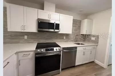 3505 Tarpon Woods Boulevard #J408, Palm Harbor, FL 34685 - Photo 4