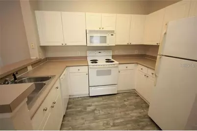 9401 Crescent Loop Circle #103, Tampa, FL 33619 - Photo 6
