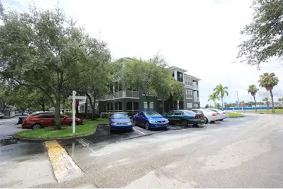 9401 Crescent Loop Circle #103, Tampa, FL 33619 - Photo 1