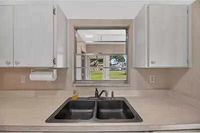 1904 Canterbury Lane #18, Sun City Center, FL 33573 - Photo 14