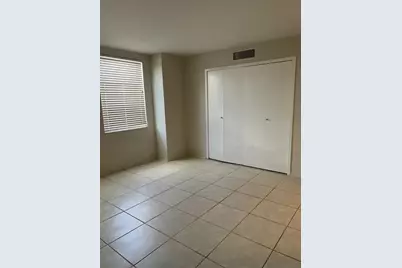 10355 Paradise Boulevard #111, Treasure Island, FL 33706 - Photo 16