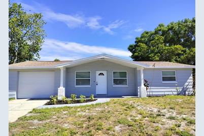 3111 Fairmount Drive, Holiday, FL 34691 - Photo 1