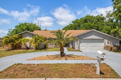 209 Normandy Circle W, Palm Harbor, FL 34683 - Photo 1