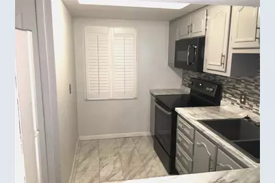 333 Lake Howard Drive NW #204C, Winter Haven, FL 33880 - Photo 4