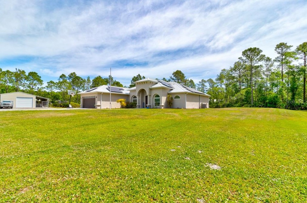 695 Meta Ln, New Smyrna, FL 32168-8808