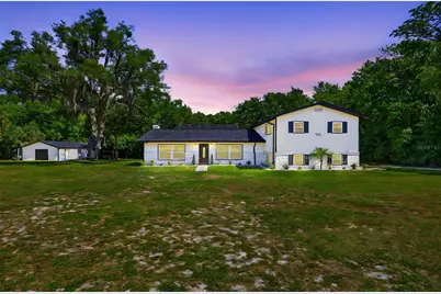 155 E Country Circle Drive E, Port Orange, FL 32128 - Photo 1