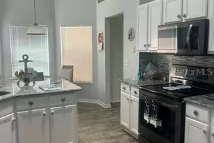 25078 Riverwalk Dr, Leesburg, FL 34748 - Photo 2