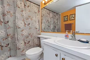 1344 Pine Ridge Cir E, Tarpon Springs, FL 34688 - Photo 14