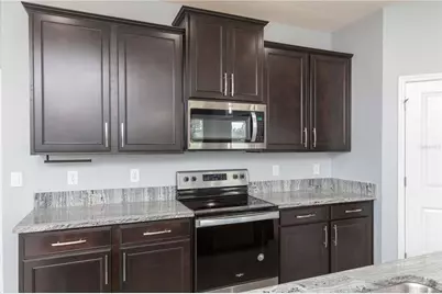 13483 Golden Lime Avenue, Spring Hill, FL 34609 - Photo 18