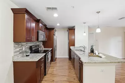 5041 Royal Palms Way #202, New Port Richey, FL 34652 - Photo 2