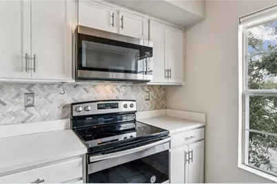 9730 Lake Chase Island Way #9730, Tampa, FL 33626 - Photo 8