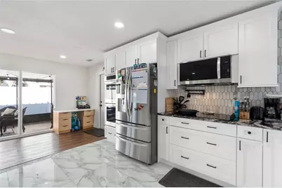 7124 Wrenwood Circle, Tampa, FL 33617 - Photo 6