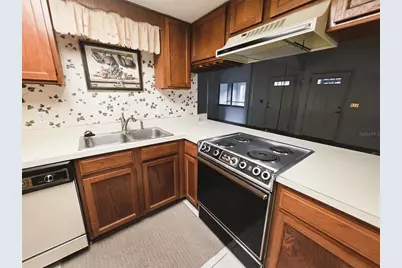 1775 Cupecoy Circle #O6, Lutz, FL 33558 - Photo 18