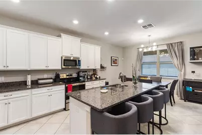 30841 Kelmin Terrace, Wesley Chapel, FL 33543 - Photo 10