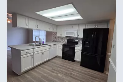 7005 Pin Cherry Lane, Port Richey, FL 34668 - Photo 6