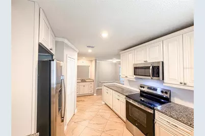 9542 Pebble Glen Avenue, Tampa, FL 33647 - Photo 20