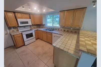 7741 Treasure Pointe Drive, Port Richey, FL 34668 - Photo 12