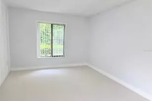 1236 Pine Ridge Cir W, Tarpon Springs, FL 34688 - Photo 12