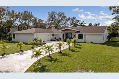 6080 Ravenwood Drive, Sarasota, FL 34243 - Photo 1