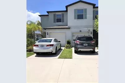 7631 French Marigold Avenue, Tampa, FL 33619 - Photo 1