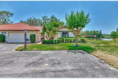 5651 Golf Pointe Drive, Sarasota, FL 34243 - Photo 1