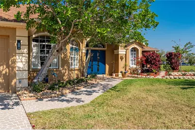 12734 SW Pembroke Circle S, Lake Suzy, FL 34269 - Photo 1