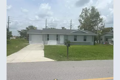 480 N Spring Lake Boulevard NW, Port Charlotte, FL 33952 - Photo 1