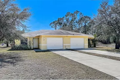 1090 Jaguar Boulevard, Lehigh Acres, FL 33974 - Photo 1