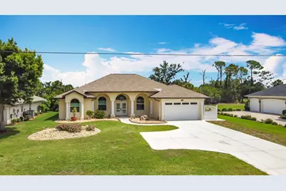 613 Boundary Boulevard, Rotonda West, FL 33947 - Photo 1