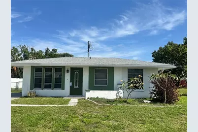 166 Dartmouth Drive NW, Port Charlotte, FL 33952 - Photo 1