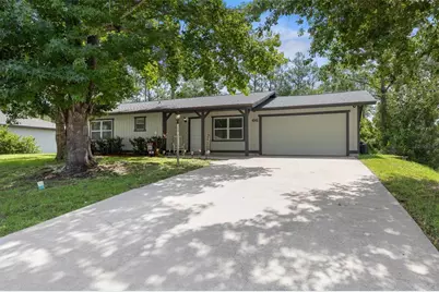 66 Pebble Beach Drive, Palm Coast, FL 32164 - Photo 1