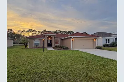 12 Point Of Woods Drive, Palm Coast, FL 32164 - Photo 1
