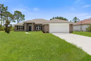 128 Bird of Paradise Dr, Palm Coast, FL 32137 - Photo 1