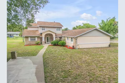 299 W Hickory Avenue, Oak Hill, FL 32759 - Photo 1