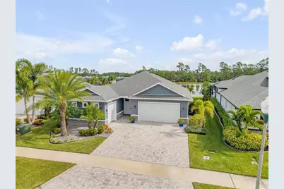351 Venetian Palms Boulevard, New Smyrna Beach, FL 32168 - Photo 1