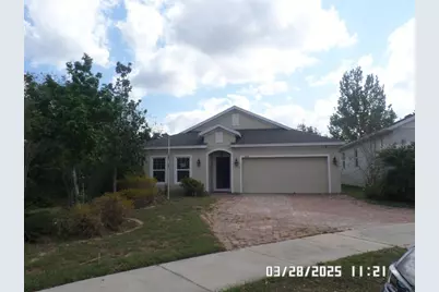 9486 Oglethorpe Drive, Groveland, FL 34736 - Photo 1