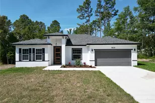 8838 N Travis Dr, Citrus Springs, FL 34434 - Photo 1