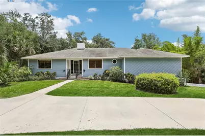 5836 Spruce Creek Woods Drive, Port Orange, FL 32127 - Photo 1