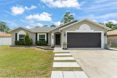 711 Cloverleaf Boulevard, Deltona, FL 32725 - Photo 1