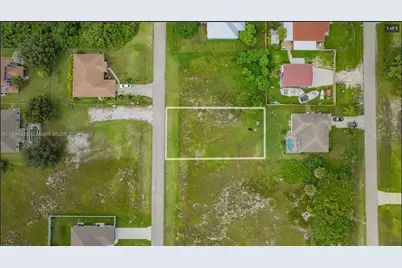 715 Downer Avenue S, Lehigh Acres, FL 33974 - Photo 1
